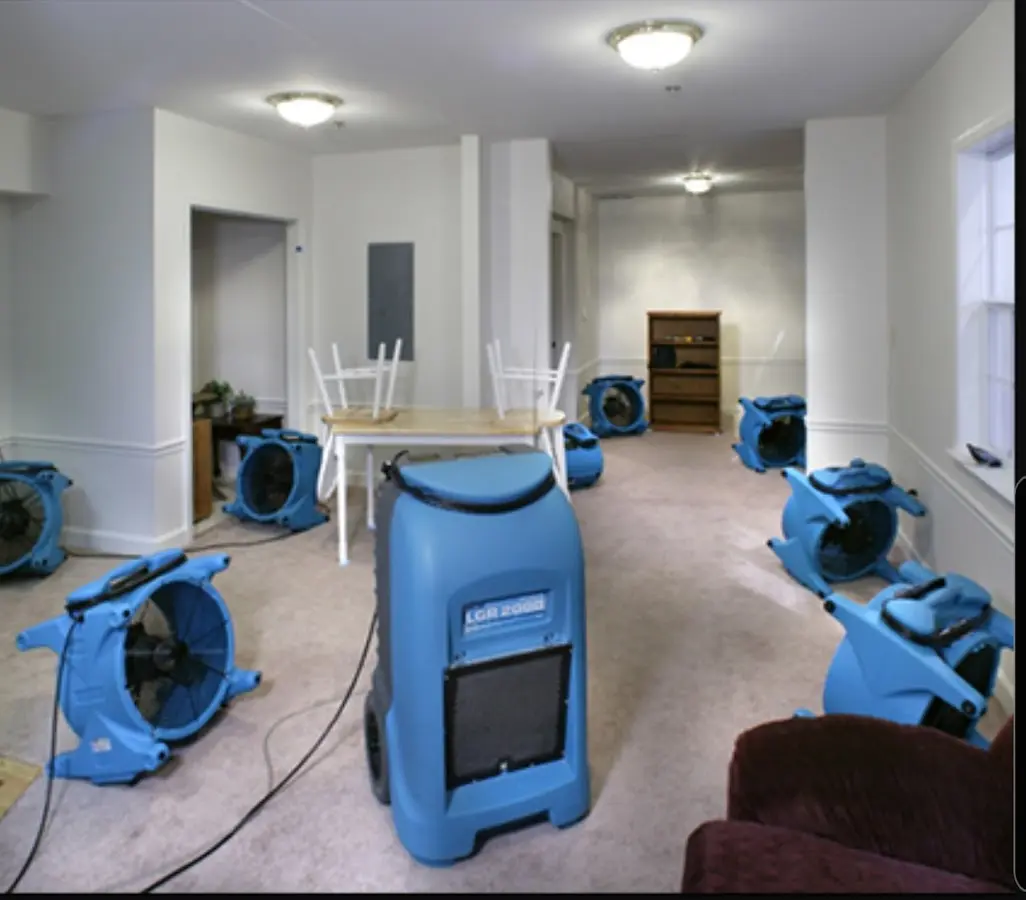 Air movers and dehumidifier setup for Water Damage Restoration in Otis Orchards-East Farms